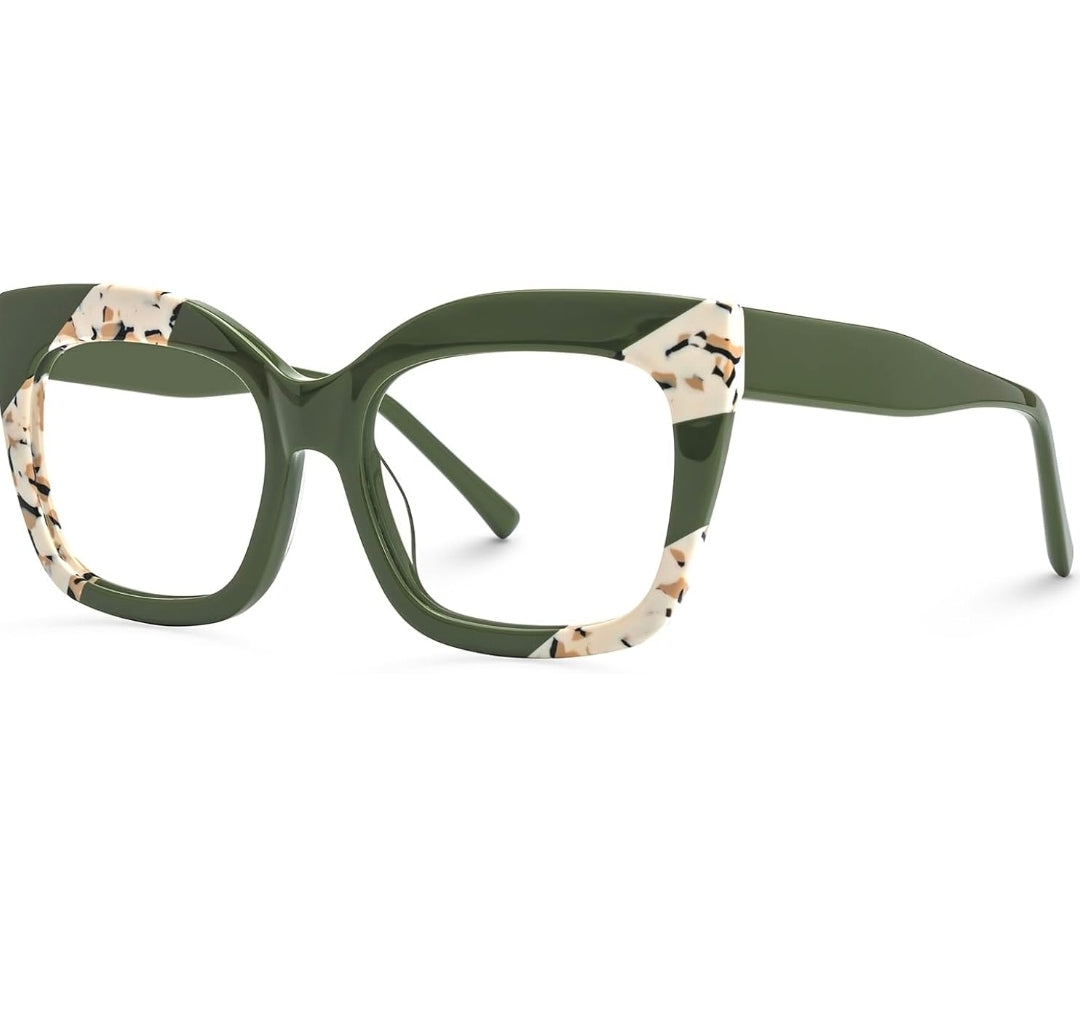 Green eyeglasses with patterned temple tips on a white background